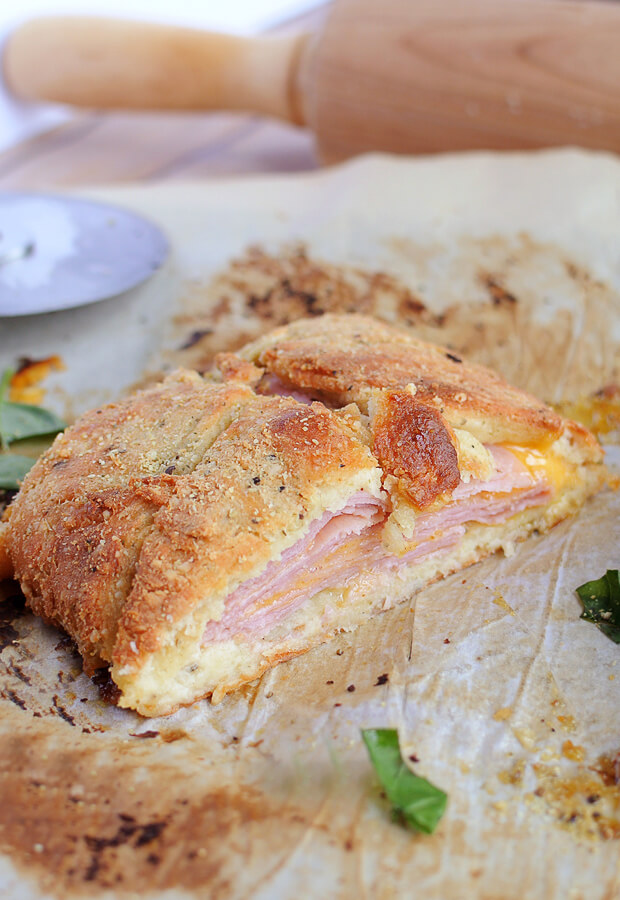 A fantastic Ham & Cheese Stromboli that can serve a family or double as appetizers for guests. Shared via //www.ruled.me/