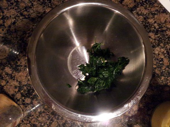 Put your spinach into a mixing bowl, don't worry that it will get cold.