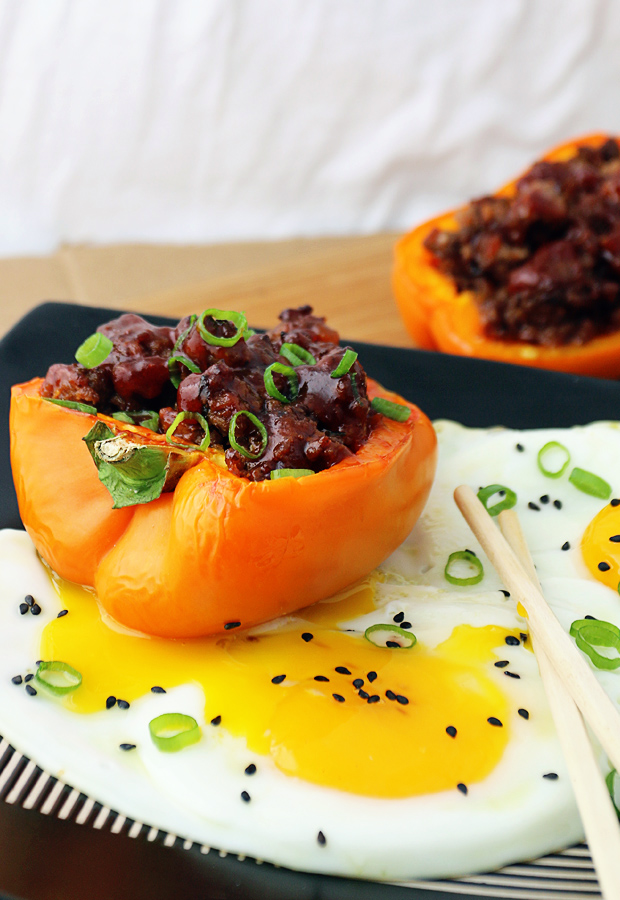 Get your Asian cravings taken care of with these Korean BBQ Beef Stuffed Bell Peppers! Shared via www.ruled.me/
