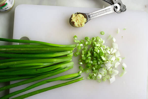 Slicing the green onions.