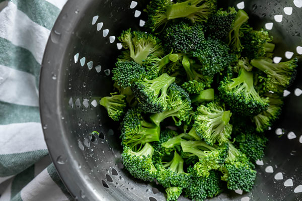 Rinsing the broccoli.