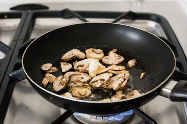 Cooking the mushrooms.